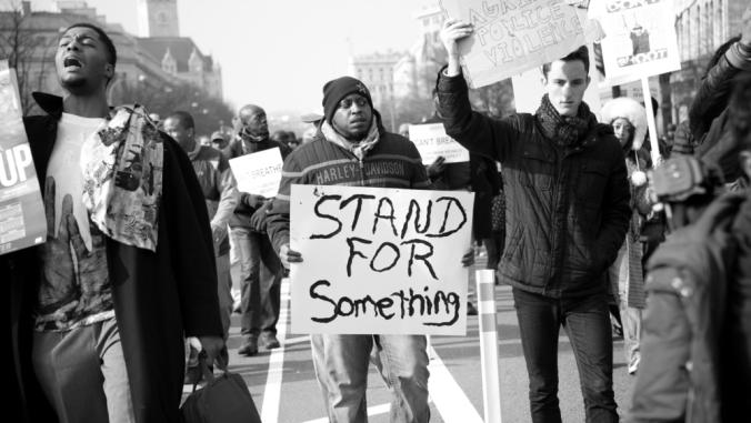 Protesters march against police shootings and racism during a rally Dec. 13, 2014 in Washington, D.C.